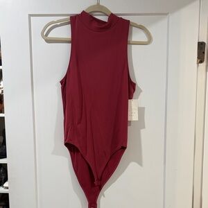 Sleeveless Mock Neck Bodysuit in Deep Berry